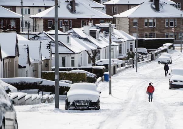 Many workers are unable to get to work during the heavy snow - but will they get paid? PIC: John Devlin/TSPL.