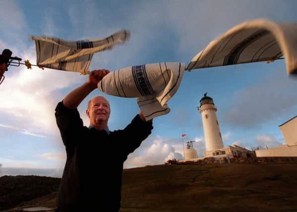 Bill Gault, former  assistant keeper at Fair Isle South, goes about his  chores in the last days before automation in 1998. PIC: Donald Macleod/TSPL.
