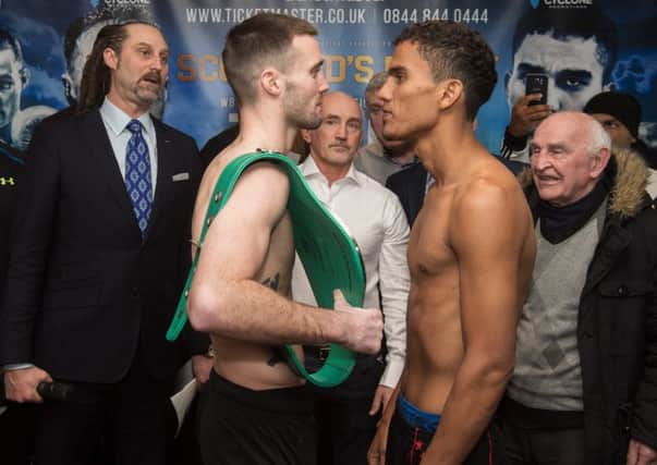 WBC Silver belt champion Josh Taylor, left, and Nicaragua's Winston Campos at the weigh-in in Glasgow. Picture: John Devlin