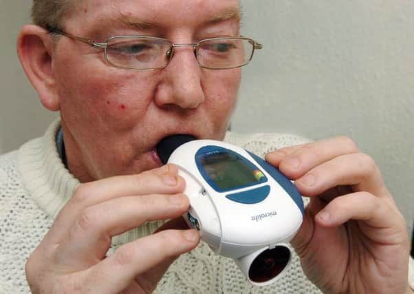 Features, Bill Henry,Adam Morris, Feb 23,2009.  Raymond Bowes who suffers from a lung disease called COPD  here we see Raymond with Microlife the device which he blows into to check out his lung capacity,the telehealth machine which Raymond connects to when calling in to the surgery