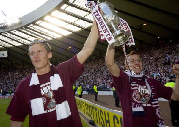 Christophe Berra celebrates the 2006 cup triumph with Hearts team-mate Roman Bednar. Picture: SNS.