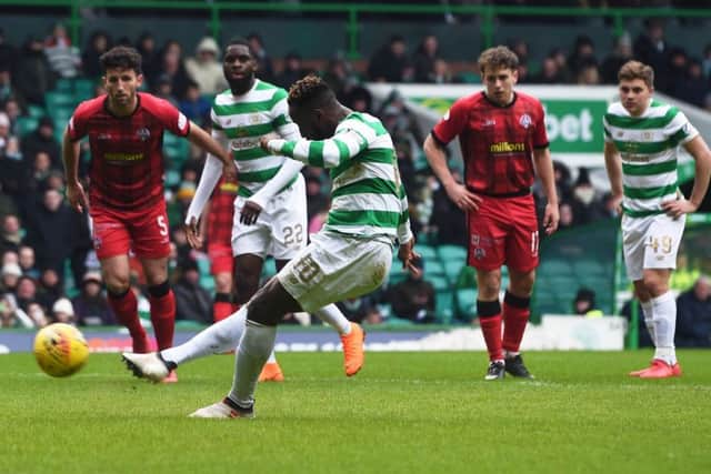 Celtic's Moussa Dembele scores a penalty to make it 2-0. Picture: SNS/Craig Foy