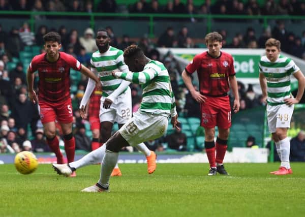Celtic's Moussa Dembele scores a penalty to make it 2-0. Picture: SNS/Craig Foy