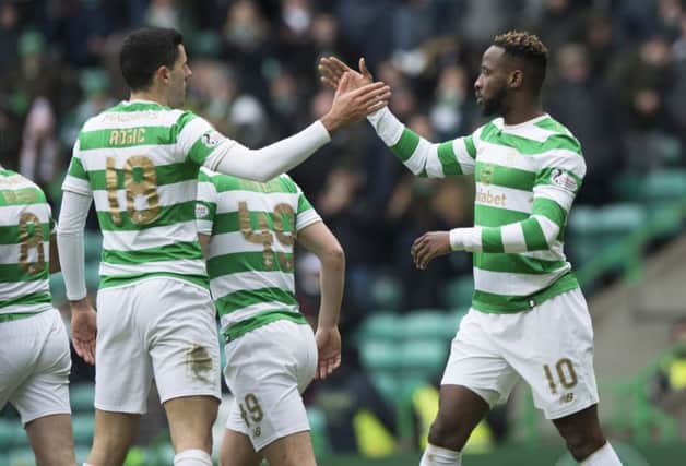 Celtic's Moussa Dembele celebrates his first goal with his teammates. Picture: SNS/Alan Harvey