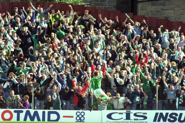 Gordon Hunter celebrates in front of the Hibs fans a after scoring the goal to end 22-in-a-row.  Photograph: Ian Rutherford