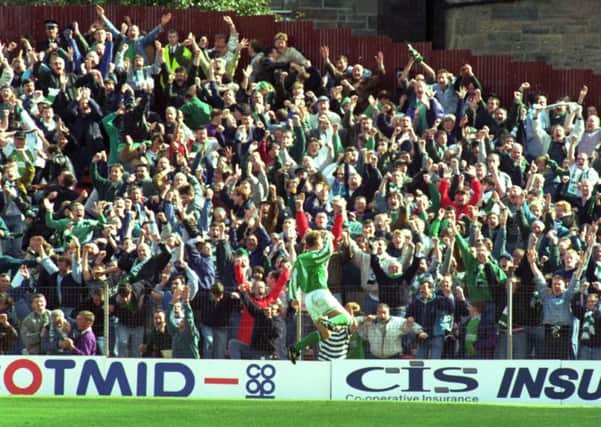 Gordon Hunter celebrates in front of the Hibs fans a after scoring the goal to end 22-in-a-row.  Photograph: Ian Rutherford