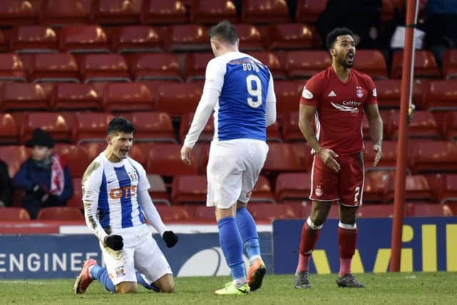 Kilmarnock's Jordan Jones (left) celebrates the award of a penalty. Picture: SNS