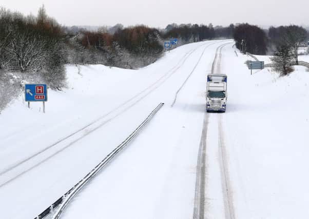 A lone lorry braves the M876, near Falkirk. Picture: Andrew Milligan/PA