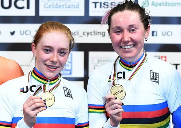 Gold medallists Emily Nelson, left, and Katie Archibald  pose on the podium after their victory in the madison at the UCI Track Cycling World Championships in Apeldoorn. Picture: Emmanuel Dunand/AFP/Getty Images