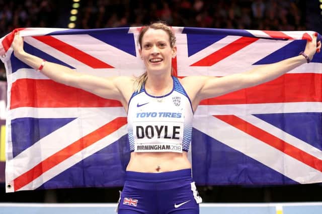 Great Britain's Eilidh Doyle celebrates getting bonze in the Woman's 400 Metres Final during day three of the 2018 IAAF Indoor World Championships. Picture: Martin Rickett/PA Wire