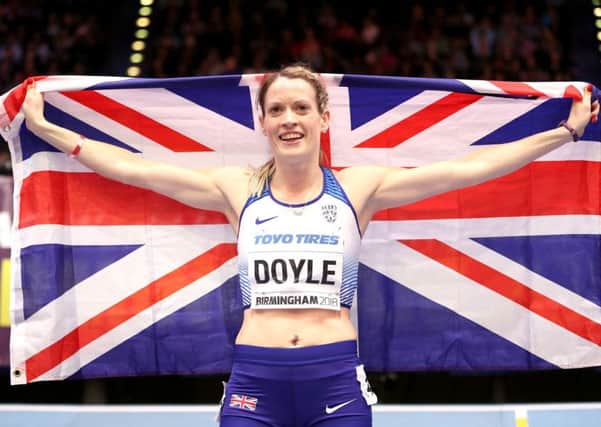 Great Britain's Eilidh Doyle celebrates getting bonze in the Woman's 400 Metres Final during day three of the 2018 IAAF Indoor World Championships. Picture: Martin Rickett/PA Wire