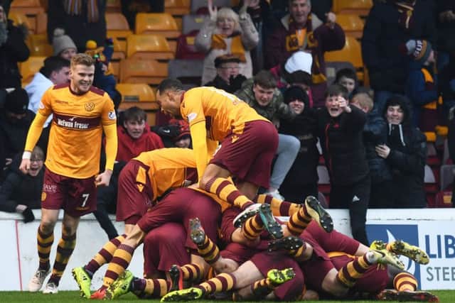 Motherwell players celebrate Carl McHugh's goal to make it 2-1. Picture: SNS