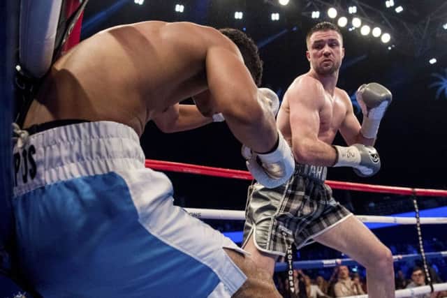 Josh Taylor catches Winston Campos with a punishing right-hand: Picture: SNS