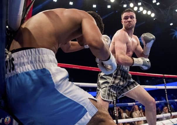 Josh Taylor catches Winston Campos with a punishing right-hand: Picture: SNS