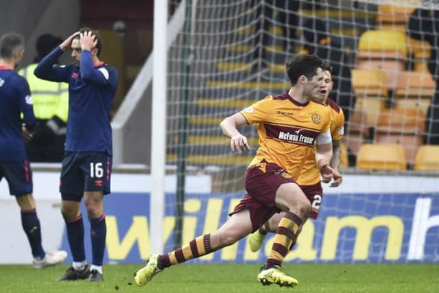 Motherwell's Carl McHugh celebrates his goal to make it 2-1. Picture: SNS