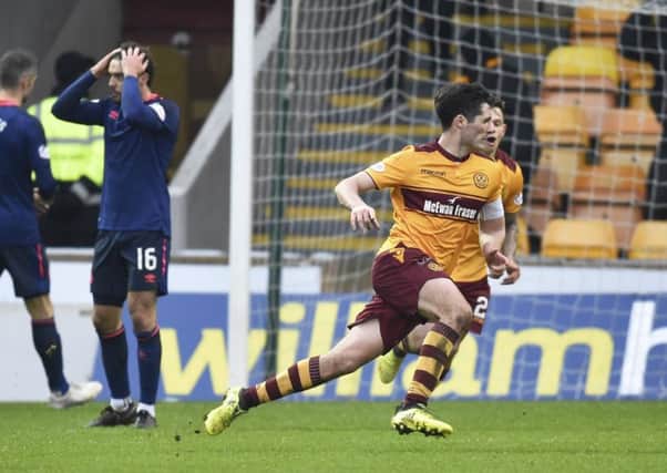 Motherwell's Carl McHugh celebrates his goal to make it 2-1. Picture: SNS