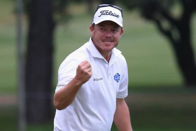 George Coetzee celebrates winning the Tshwane Open in Pretoria. Picture: Getty