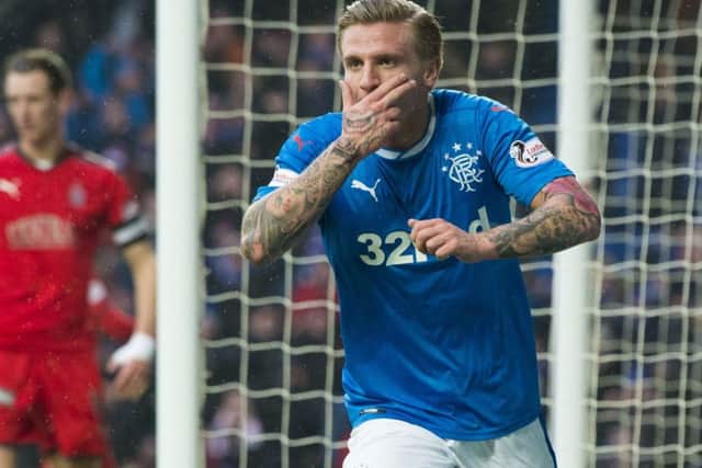 Jason Cummings celebrates after scoring the first of his three goals. Picture: SNS
