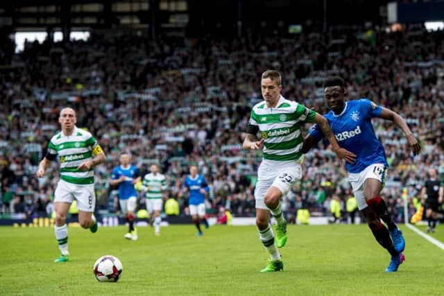 Celtic and Rangers squared off in last season's semi-final. Picture: SNS