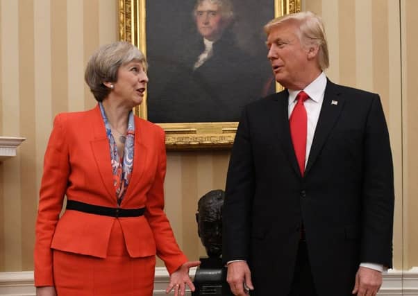 May has told Trump of her "deep concern" at the president's plan to introduce tariffs on steel and aluminium imports to the United States which have sparked fears of a trade war. Picture; PA