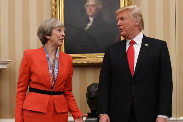 May has told Trump of her "deep concern" at the president's plan to introduce tariffs on steel and aluminium imports to the United States which have sparked fears of a trade war. Picture; PA