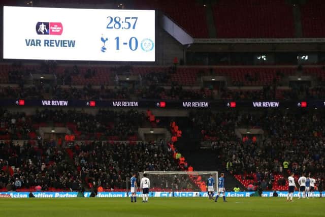 A VAR review during Tottenham Hotspur's match with Rochdale at Wembley. Picture: PA