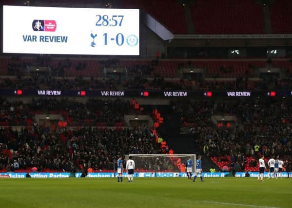 A VAR review during Tottenham Hotspur's match with Rochdale at Wembley. Picture: PA