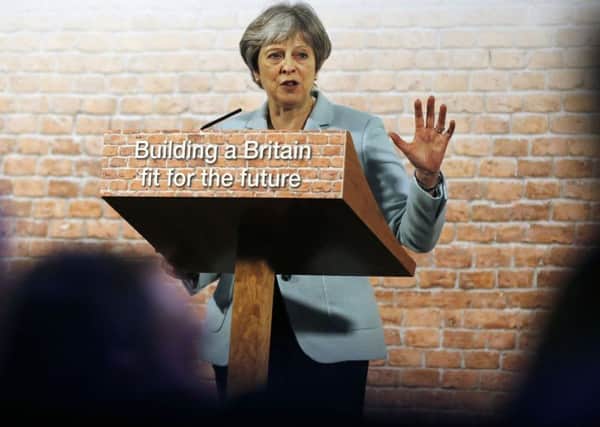 Theresa May delivers a speech in central London yesterday. She says she cannot accept the EUs fall-back plan for the Irish border. Picture: Getty