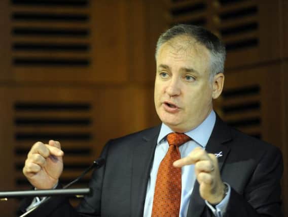 Richard Lochhead has campaigned for fairer delivery charges in the Highlands and Islands.