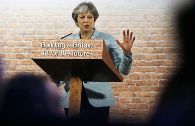 Britain's Prime Minister Theresa May delivers a speech in central London. Picture: Frank Augstein