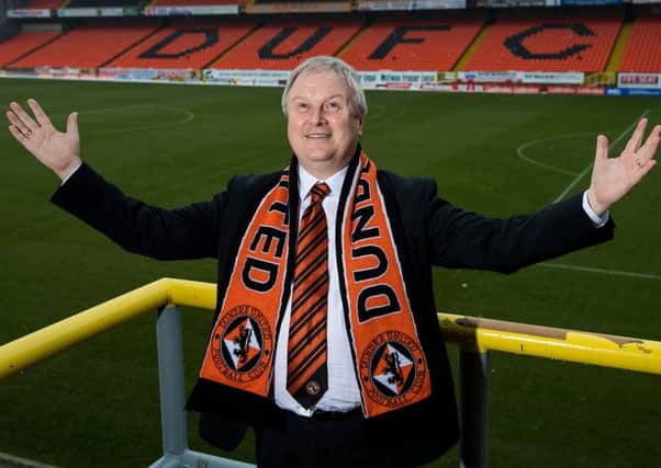 Paraded at Tannadice yesterday, Mike Martin had words of praise for boss Csaba Laszlo.