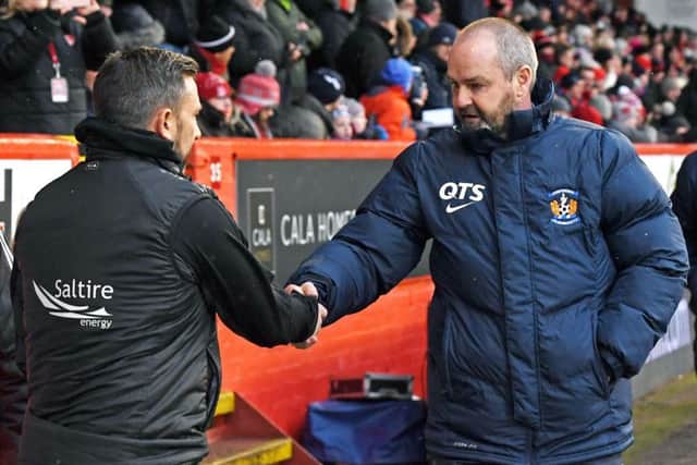Derek McInnes shakes hands with Kilmarnock manager Steve Clarke ahead of last Saturday's match. Picture: SNS