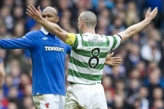Scott Brown celebrates his strike in front of El Hadji Diouf in a Scottish Cup game in 2011. Picture: SNS