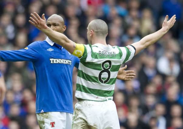 Scott Brown celebrates his strike in front of El Hadji Diouf in a Scottish Cup game in 2011. Picture: SNS