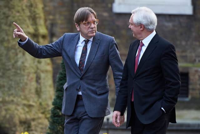Britain's Secretary of State for Exiting the European Union David Davis (right) reacts as he talks with the European Parliament's Brexit coordinator Guy Verhofstadt. Picture: Niklas Hallenniklas