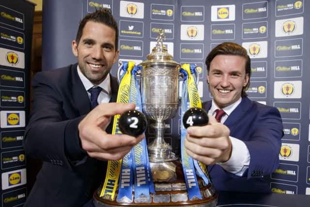 Livingston goalkeeper Neil Alexander and tennis player Gordon Reid
made the Scottish Cup semi-final draw, which paired Rangers with Celtic and Motherwell with either Aberdeen or Kilmarnock. Picture: Steve Welsh