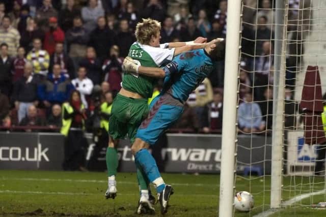 Dean Shiels barges into Craig Gordon during an Edinburgh derby in December 2006. Picture: PA