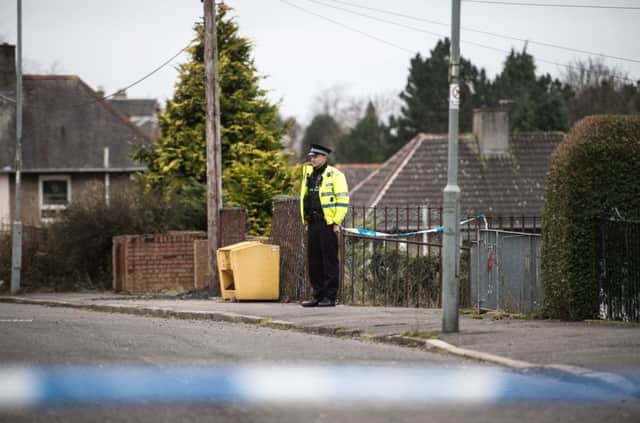 Police at the scene of the shooting. Picture: John Devlin