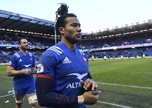 France wing Teddy Thomas cuts a dejected figure after the defeat by Scotland at BT Murrayfield. Picture: AFP/Getty