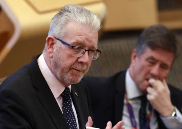 Brexit minister Michael Russell said he plans to publish the 25 areas in the UK Governments EU Withdrawal Bill where the two sides cannot agree as soon as possible. Picture: Andrew Cowan