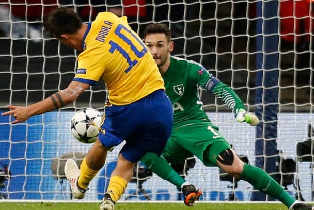 Paulo Dybala applies a cool finish after running through on goal to send Spurs out of Europe. Picture: AFP/Getty