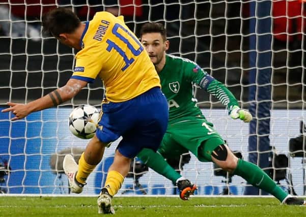 Paulo Dybala applies a cool finish after running through on goal to send Spurs out of Europe. Picture: AFP/Getty
