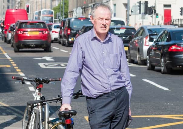 Ian Maxwell of Spokes cycles four miles to work every day. Picture: Ian Georgeson
