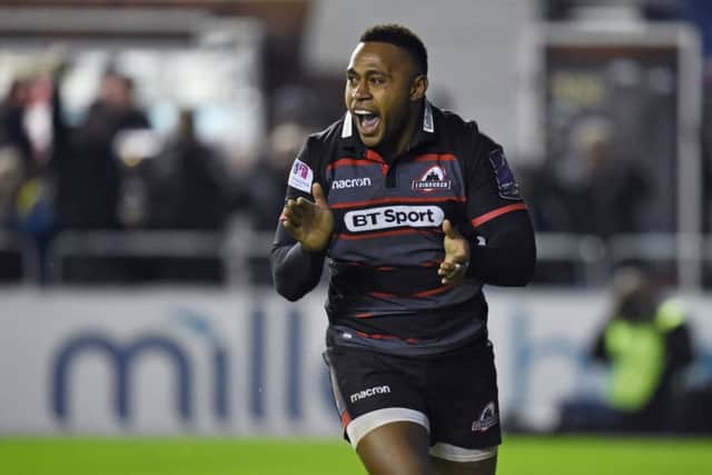 Junior Rasolea celebrates his winning try against Stade Francais in January. Picture: SNS Group
