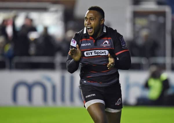 Junior Rasolea celebrates his winning try against Stade Francais in January. Picture: SNS Group