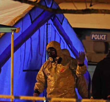 Investigators next to a police tent in Salisbury near to where former Russian double agent Sergei Skripal was found critically ill by exposure to an unknown substance. Photograph: Steve Parsons/PA