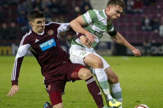 Derk Boerrigter in action for Celtic against Hearts' Callum Paterson in 2013. Picture: Craig Foy/SNS