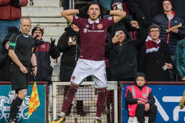Hearts fans would love for winger David Milinkovic to stick around. Picture: SNS