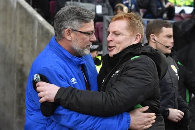Craig Levein, left, and Neil Lennon share a cordial moment before Hearts win in the Scottish Cup in January. Picture: Rob Casey/SNS