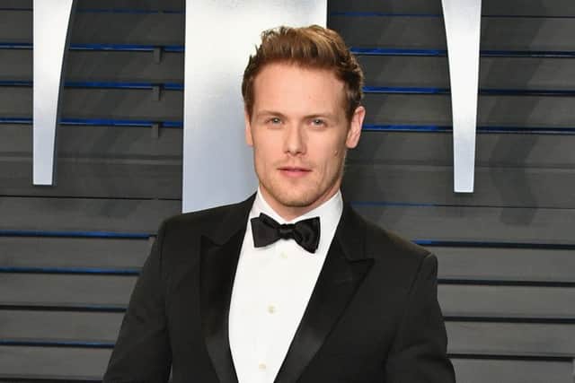 Actors Sam Heughan (pictured) Morven Christie, John Gordon Sinclair and Kate Dickie have joined the campaign to save Scottish Youth Theatre. Picture: Getty